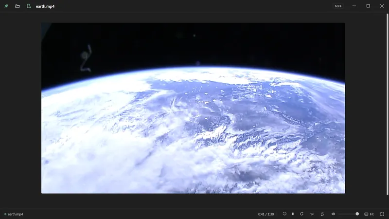 A film of the Earth from orbit, playing.